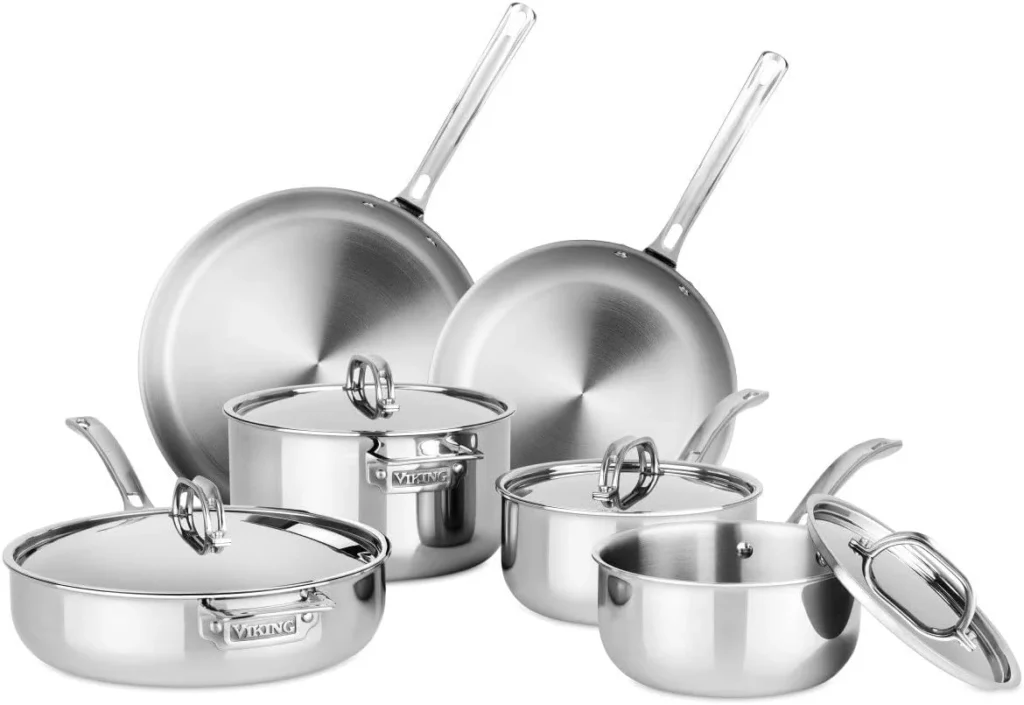 Hestan NanoBond molecular titanium skillet searing a steak in a modern kitchen