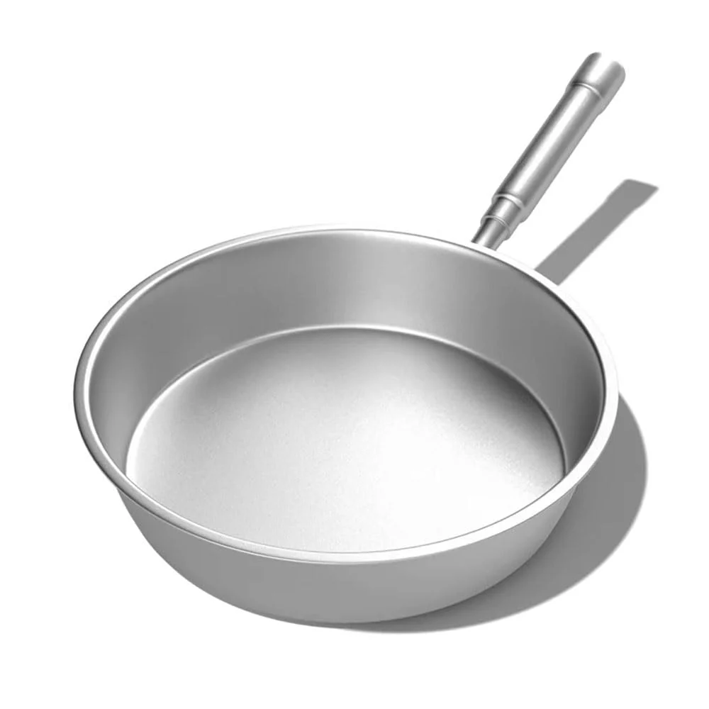 Pure titanium frying pan close-up showing the natural metallic surface and lightweight construction