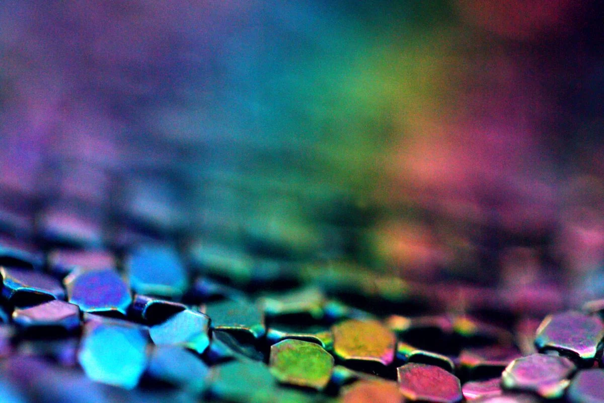 The Real Titanium Cookware Maintenance Guide: Care Routines That Actually Work 3 Titanium pan showing rainbow iridescent blue and gold discoloration from high heat oxidation - normal cosmetic effect not damage