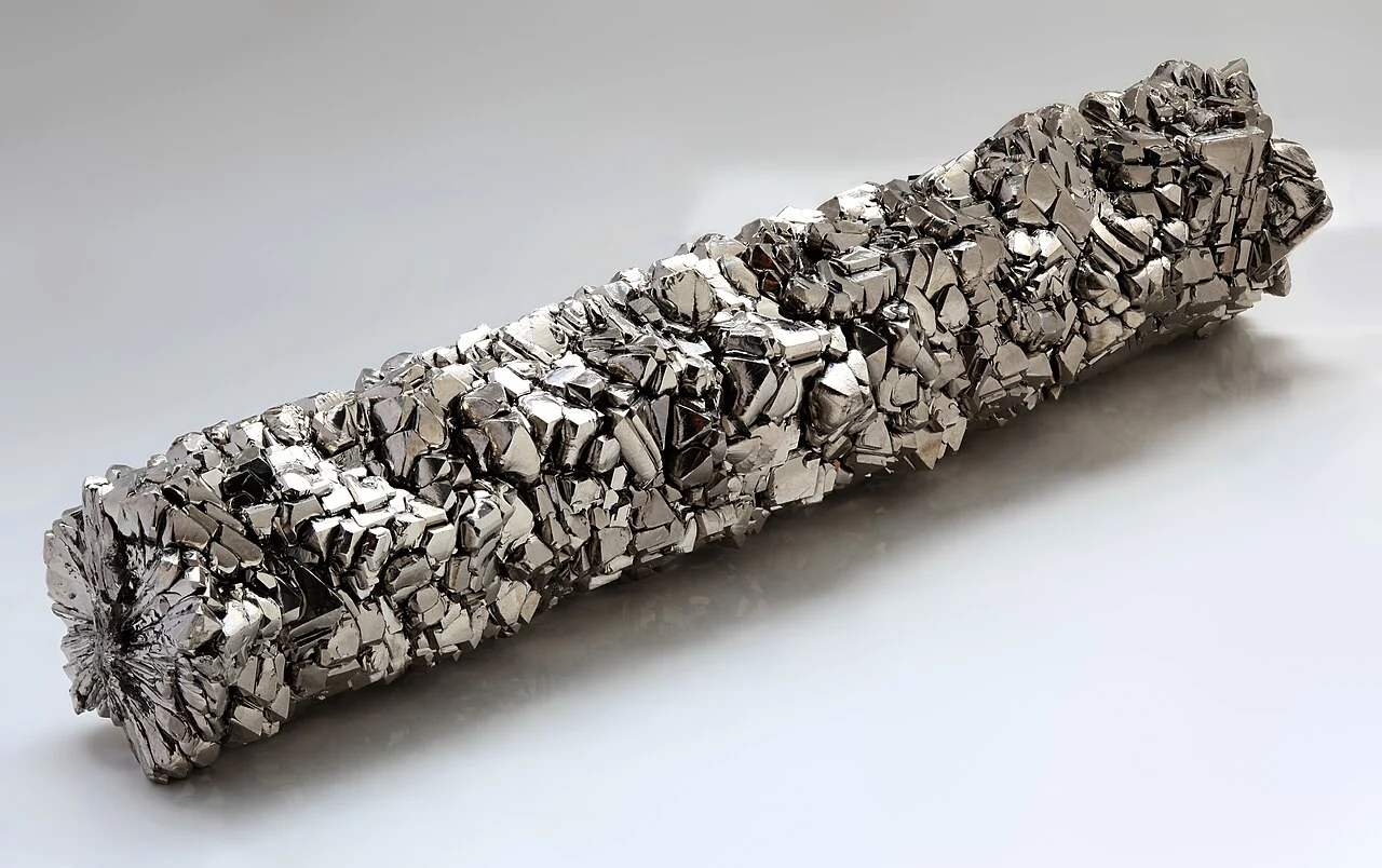 Titanium crystal bar - pure titanium material with characteristic metallic luster used in aerospace and industrial applications Titanium crystal bar - pure titanium material with characteristic metallic luster used in aerospace and industrial applications